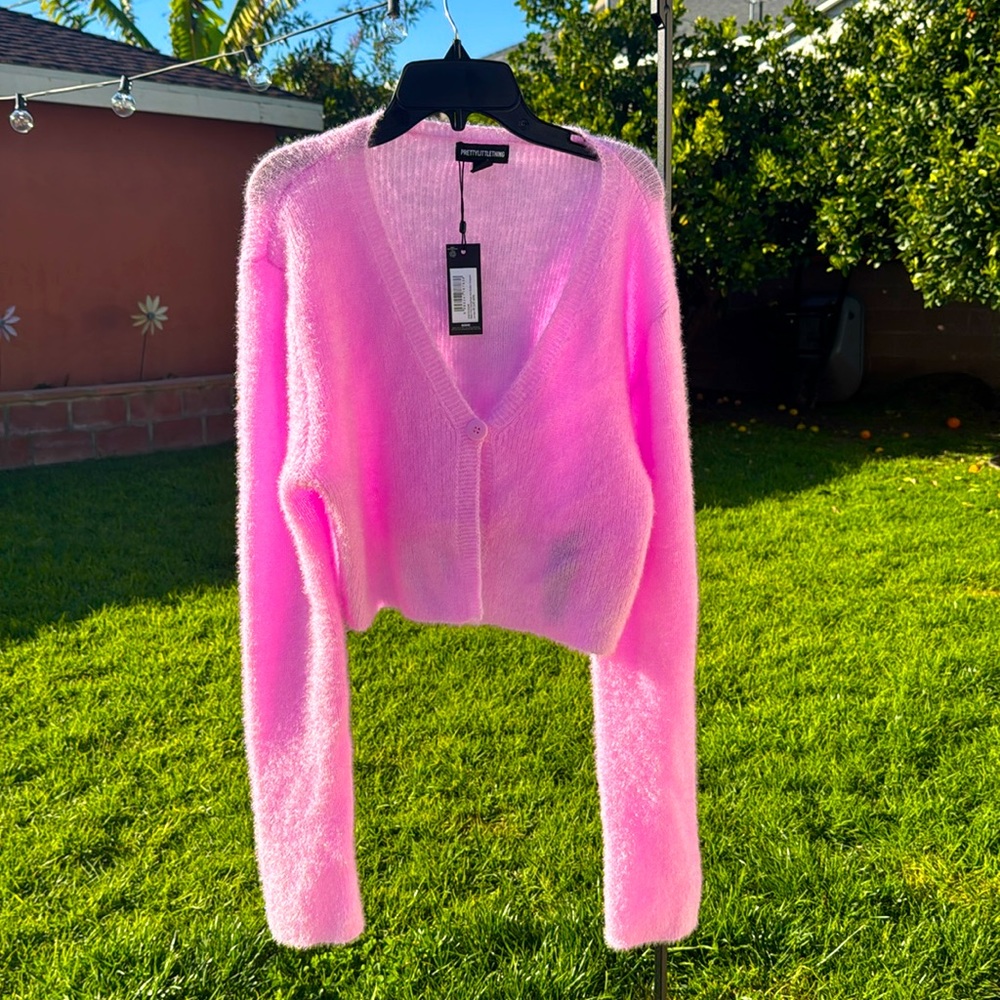 Bright pink sweater, women’s size Medium